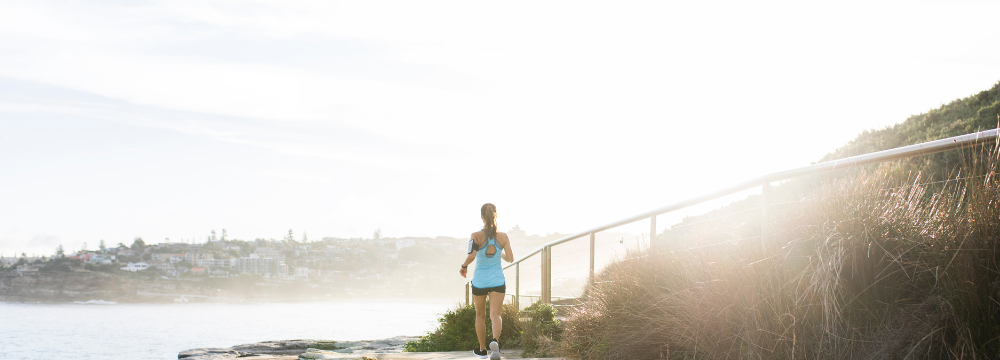 Woman running with Breast Implants